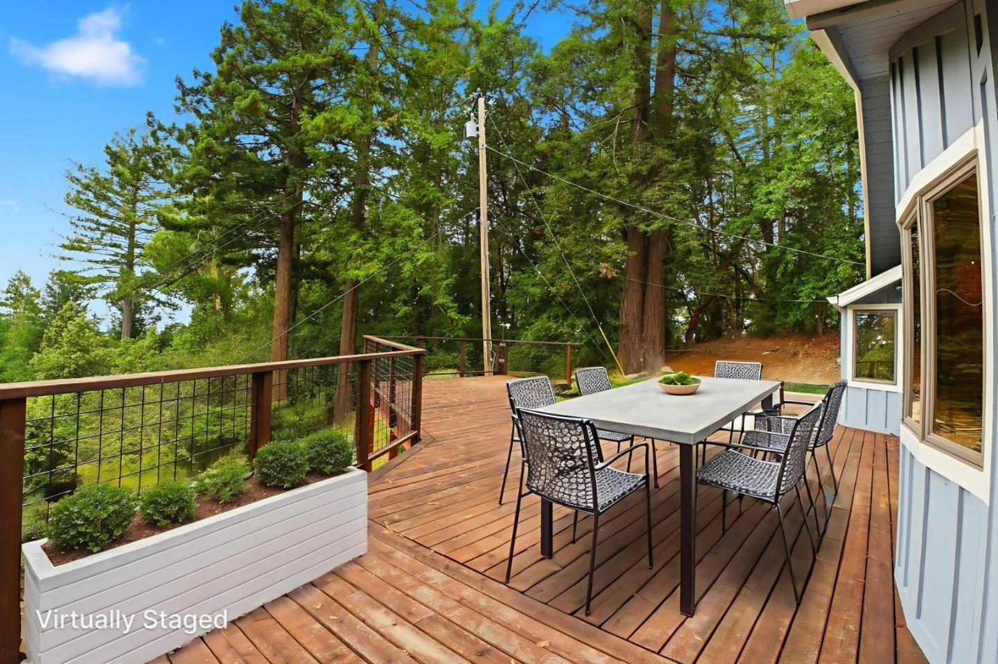 15245 Stetson Road Los Gatos, CA 95033 - Photo 52 of 60 a view of a balcony with table and chairs
