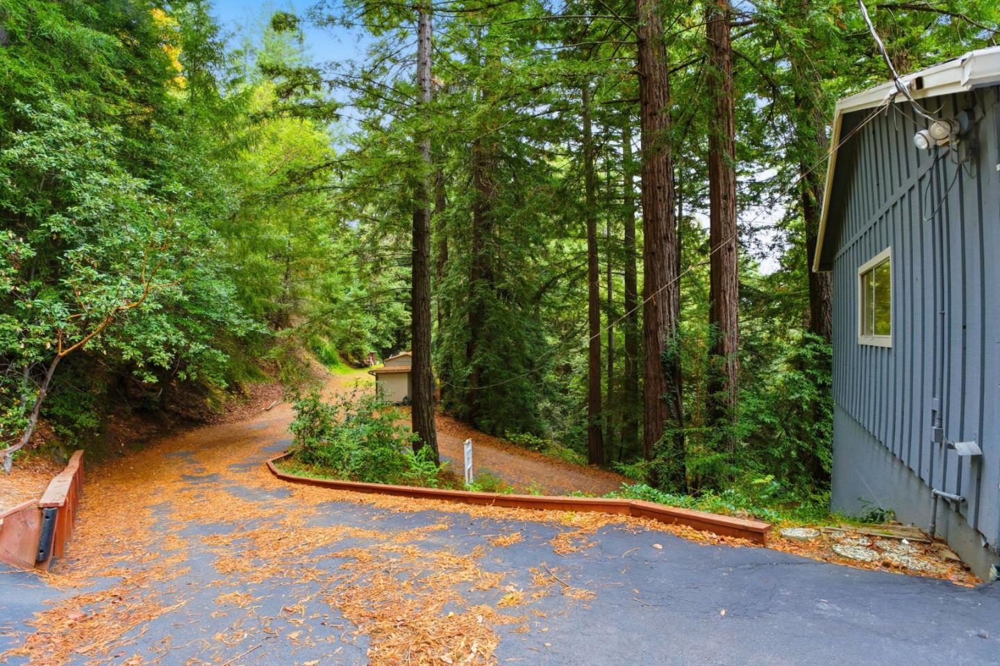 15245 Stetson Road Los Gatos, CA 95033 - Photo 56 of 60 a backyard of a house with lots of green space