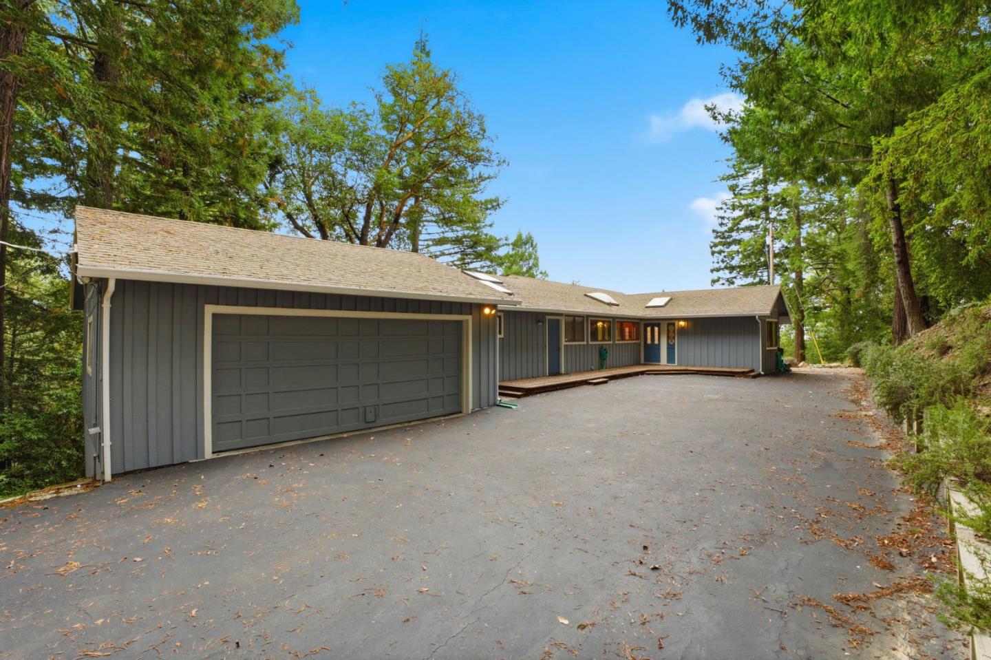 15245 Stetson Road Los Gatos, CA 95033 - Photo 6 of 60 a front view of house with yard and trees in the background