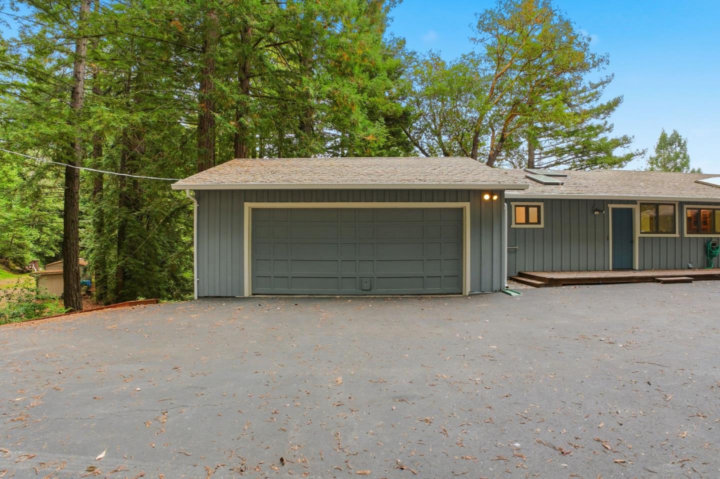 15245 Stetson Road Los Gatos, CA 95033 - Photo 7 of 60 a front view of a house with a garage