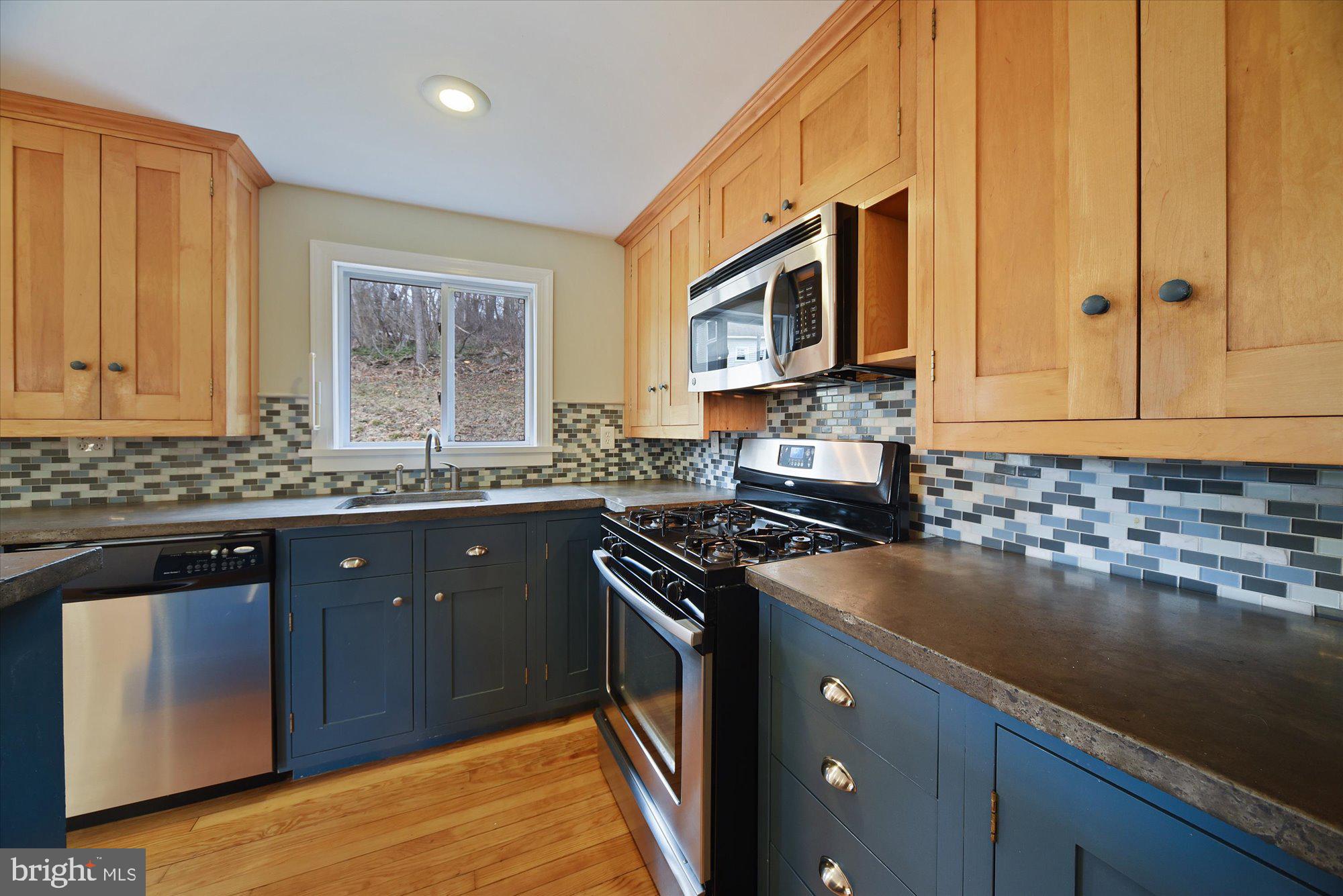 19312 Ensor Road White Hall, MD 21161 - Photo 3 of 33 Handmade cabinets, SS & concrete counters