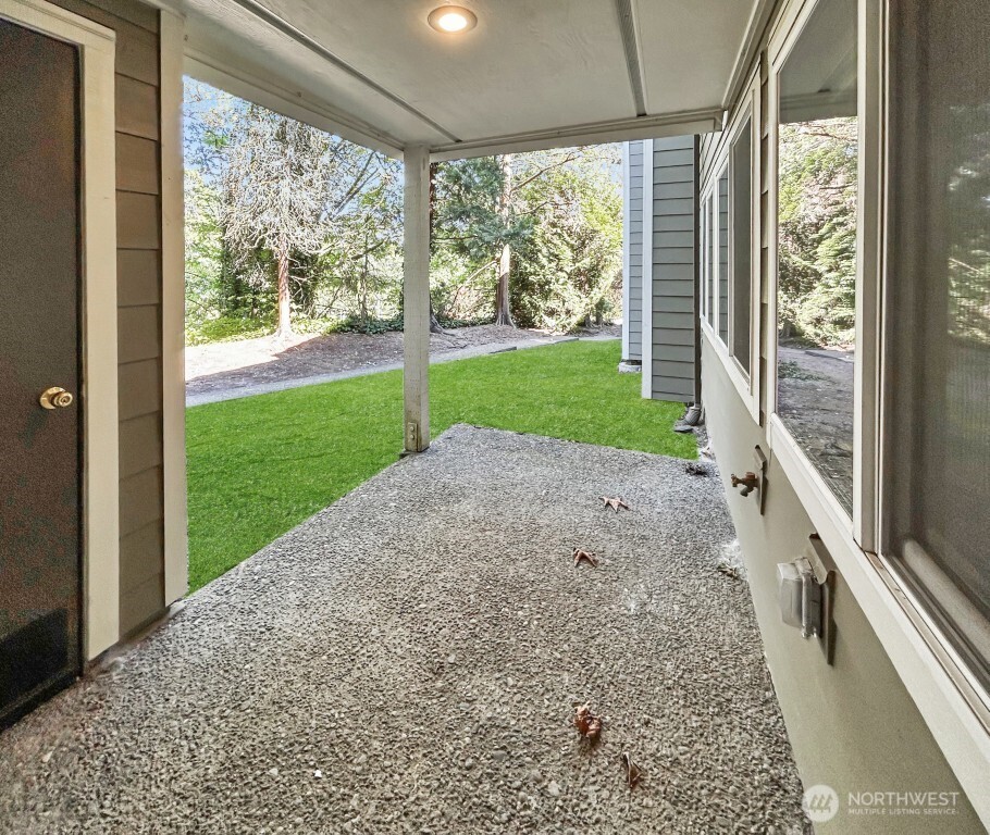 7571 Old Redmond Road, Unit 7 Redmond, WA 98052 - Photo 17 of 17 a view of a porch with backyard