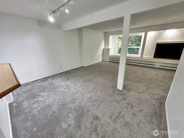 an empty room with windows