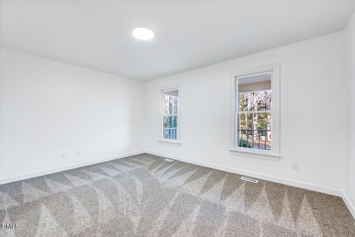 1208 Turner Farms Road Garner, NC 27529 - Photo 21 of 38 an empty room with windows
