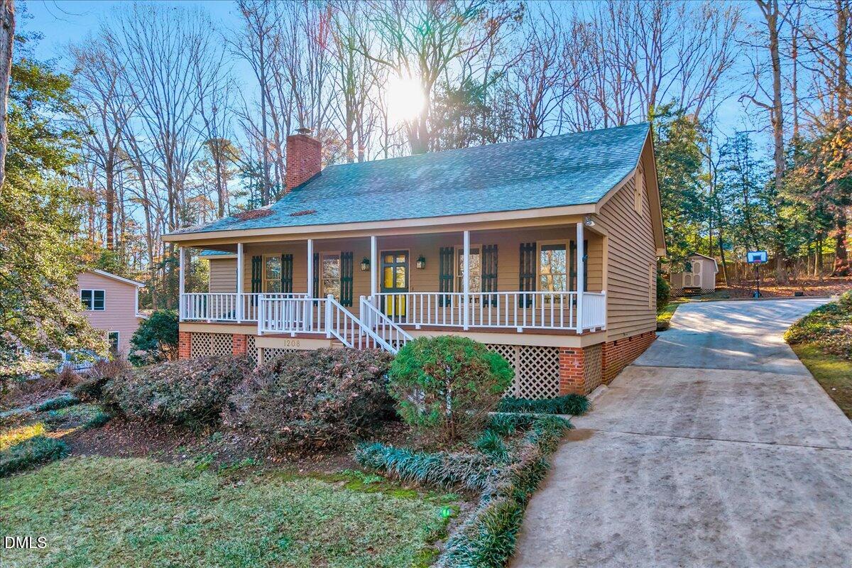 1208 Turner Farms Road Garner, NC 27529 - Photo 7 of 38 a view of a house with backyard and garden