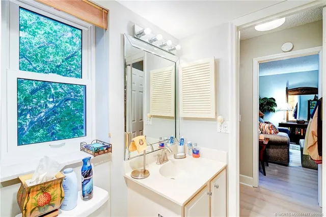 a view of a chairs and table in the garden