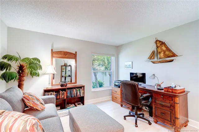 a front view of a building with garden