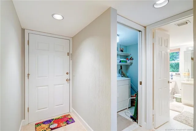 a kitchen with stainless steel appliances a stove a refrigerator and a refrigerator