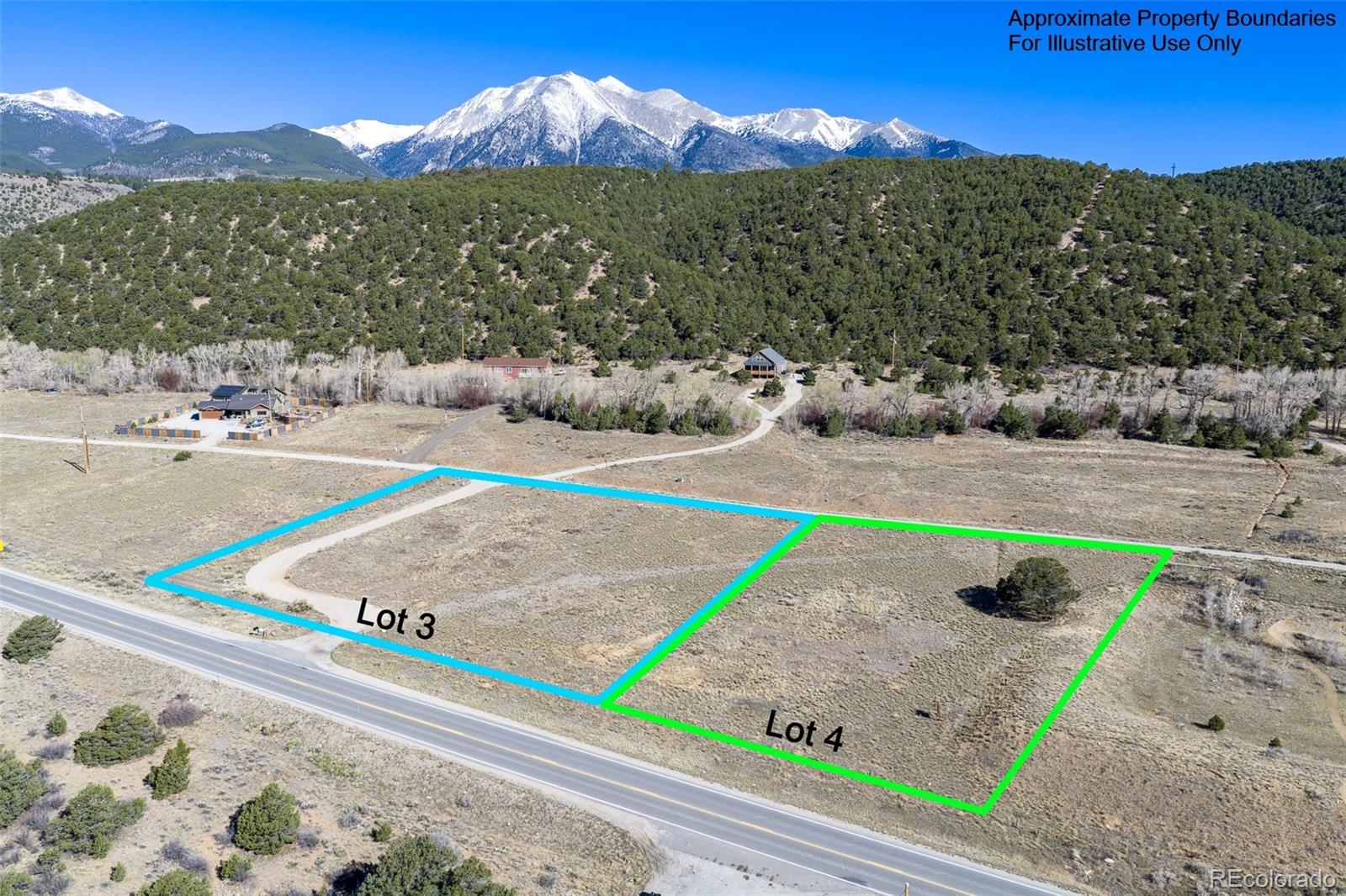 16509 Rocky Mountain Road Salida, CO 81201 - Photo 1 of 12 a view of a white house with a yard and sitting area