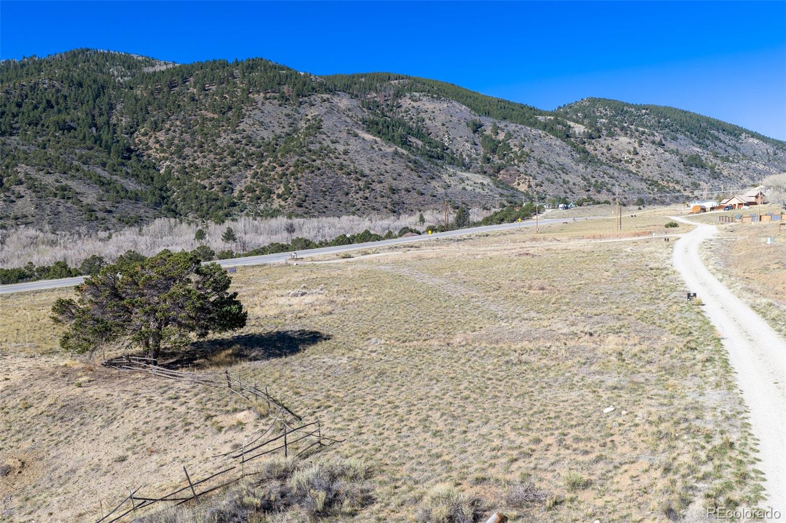 16509 Rocky Mountain Road Salida, CO 81201 - Photo 11 of 12 a view of a yard with a mountain