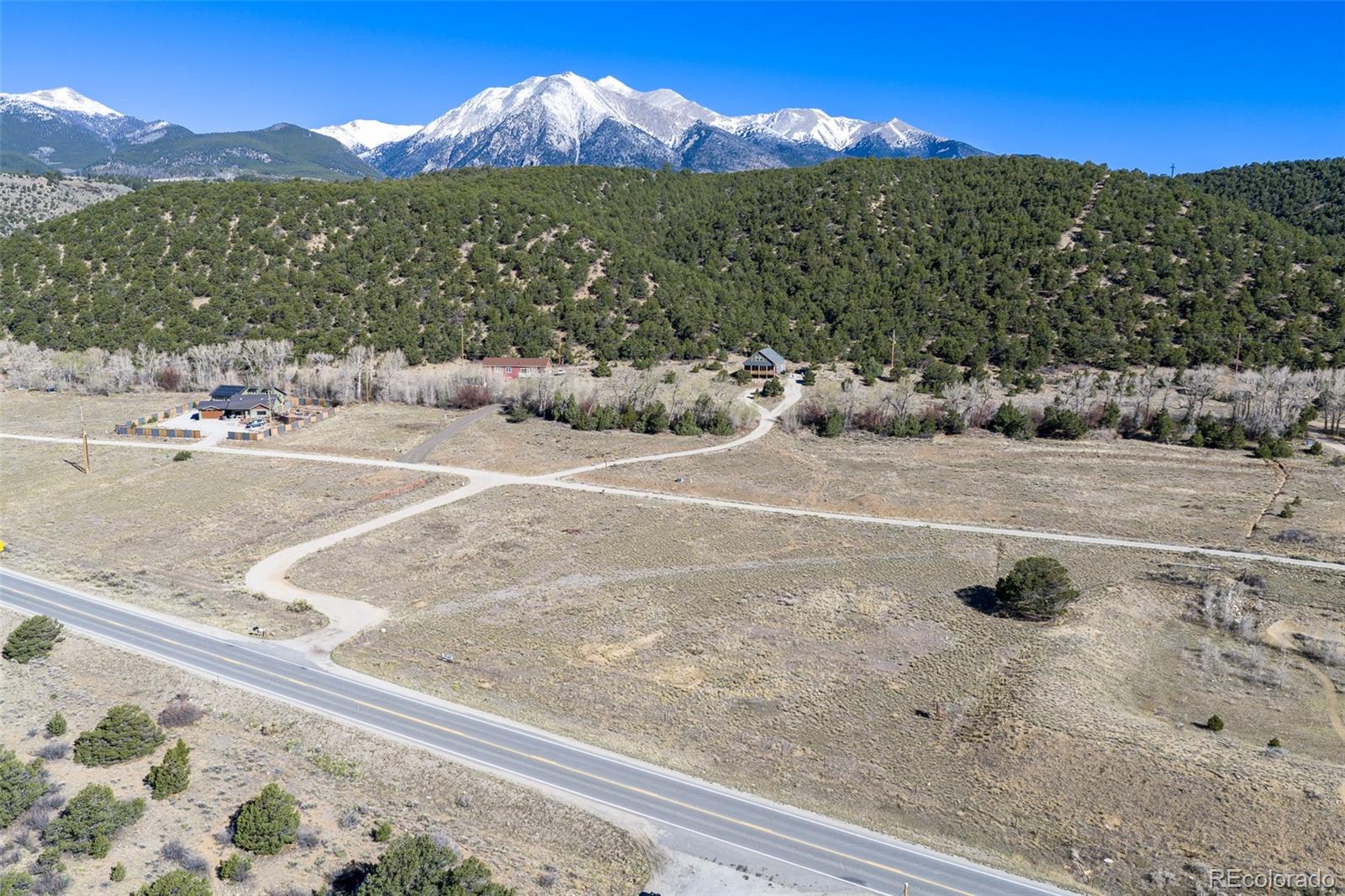 16509 Rocky Mountain Road Salida, CO 81201 - Photo 8 of 12 a view of a street with a mountain in the background