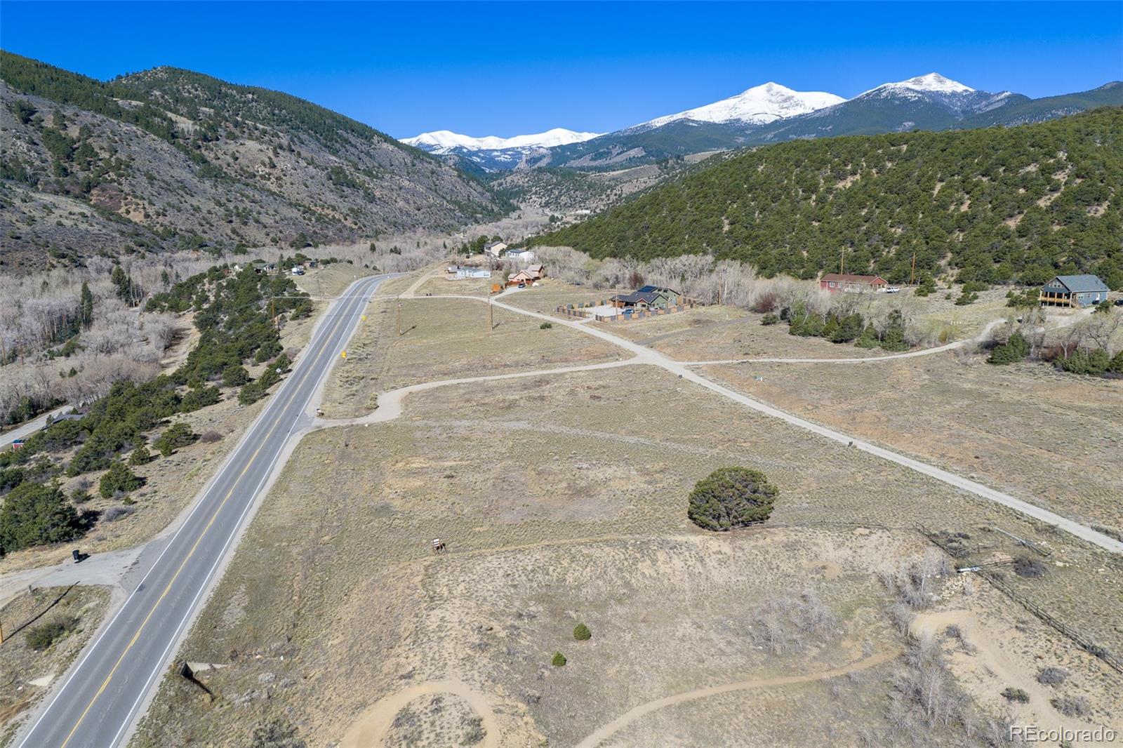 16509 Rocky Mountain Road Salida, CO 81201 - Photo 9 of 12 a view of a house with a mountain yard