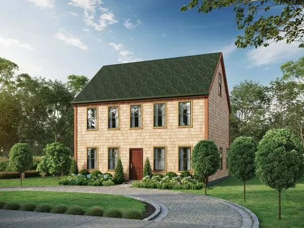 front view of a house with a garden