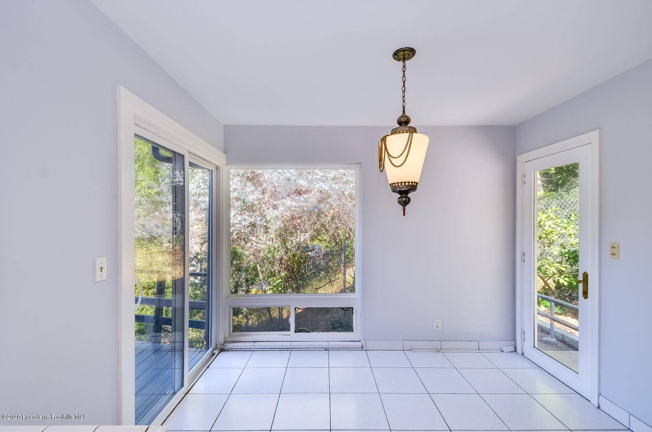 588 Glen Holly Drive Pasadena, CA 91105 - Photo 12 of 31 a view of an entryway with chandelier