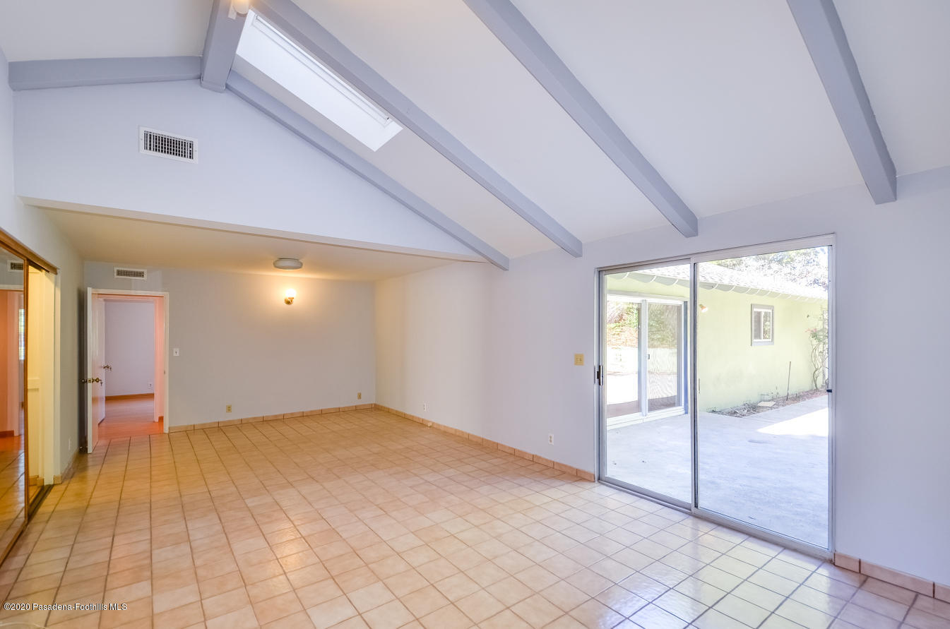 588 Glen Holly Drive Pasadena, CA 91105 - Photo 15 of 31 a view of an empty room and window