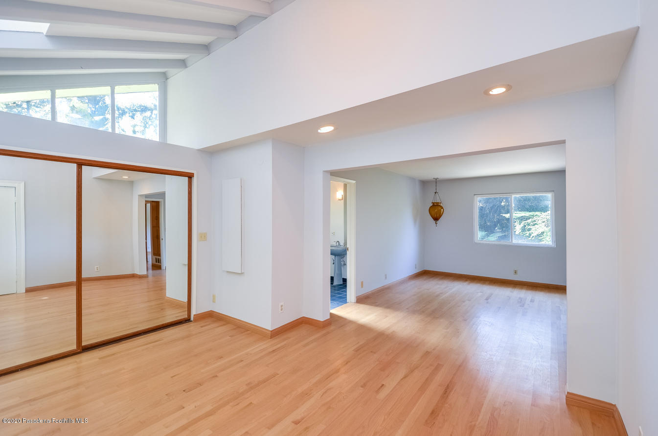 588 Glen Holly Drive Pasadena, CA 91105 - Photo 19 of 31 a view of an empty room window and wooden floor