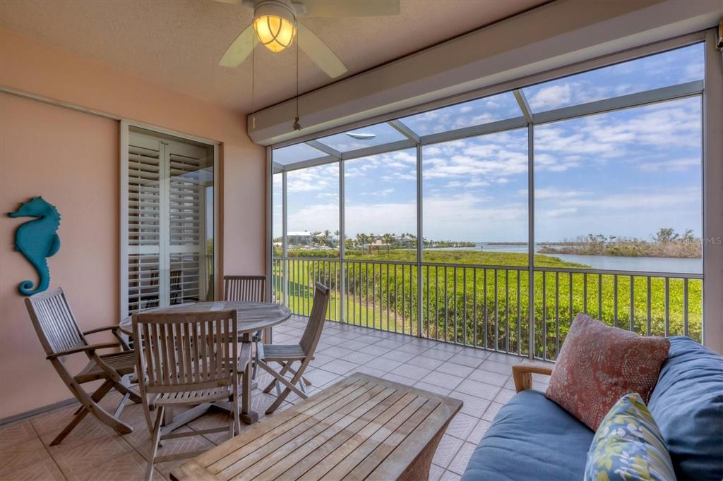 13313 Gasparilla Road, Unit 204 Placida, FL 33946 - Photo 3 of 28 a view of a balcony with furniture