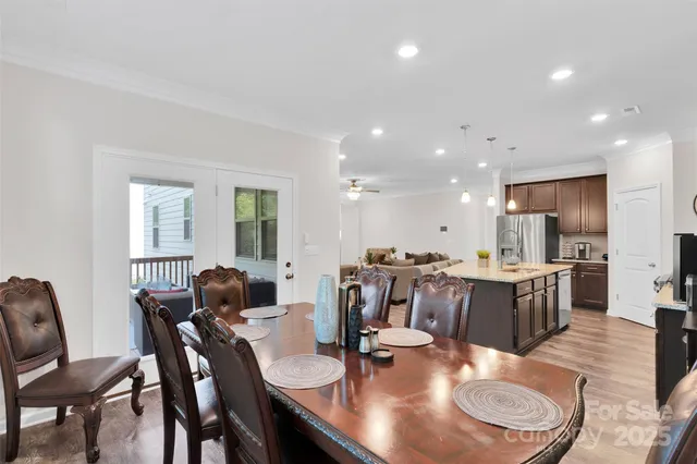a hallway with cabinet and entryway