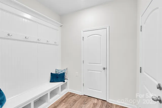 a bathroom with a toilet sink and shower