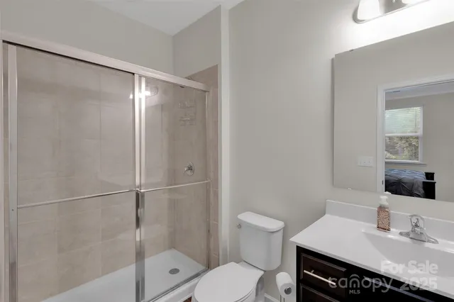 a view of a two chairs in the deck