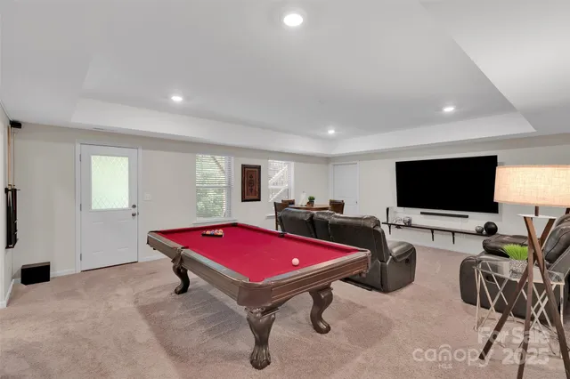 a living room with furniture and a table