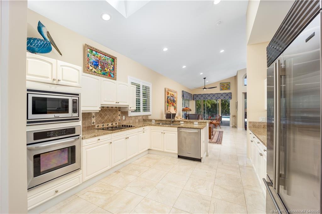 2888 Southeast Dune Drive Stuart, FL 34996 - Photo 23 of 53 Casual gathering just off the kitchen