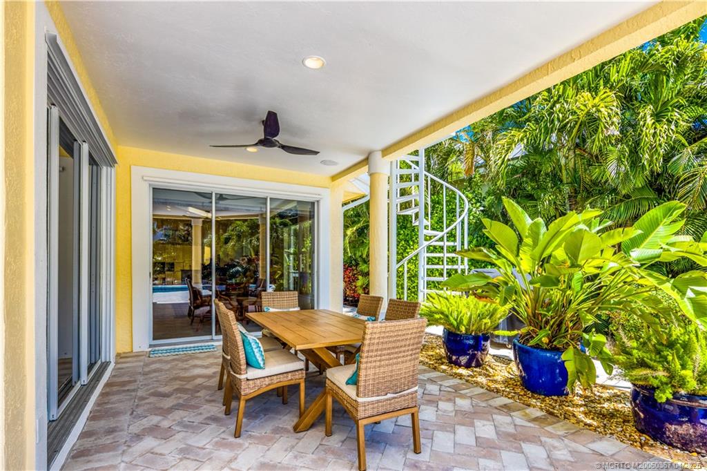 2888 Southeast Dune Drive Stuart, FL 34996 - Photo 30 of 53 Covered area just off family and living rooms