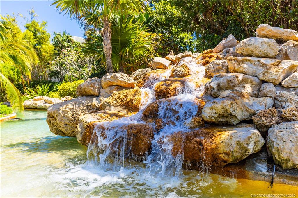 2888 Southeast Dune Drive Stuart, FL 34996 - Photo 33 of 53 Waterfall connected to winding river