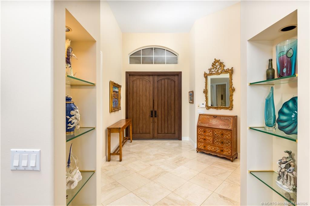 2888 Southeast Dune Drive Stuart, FL 34996 - Photo 10 of 53 Looking to front door from inside