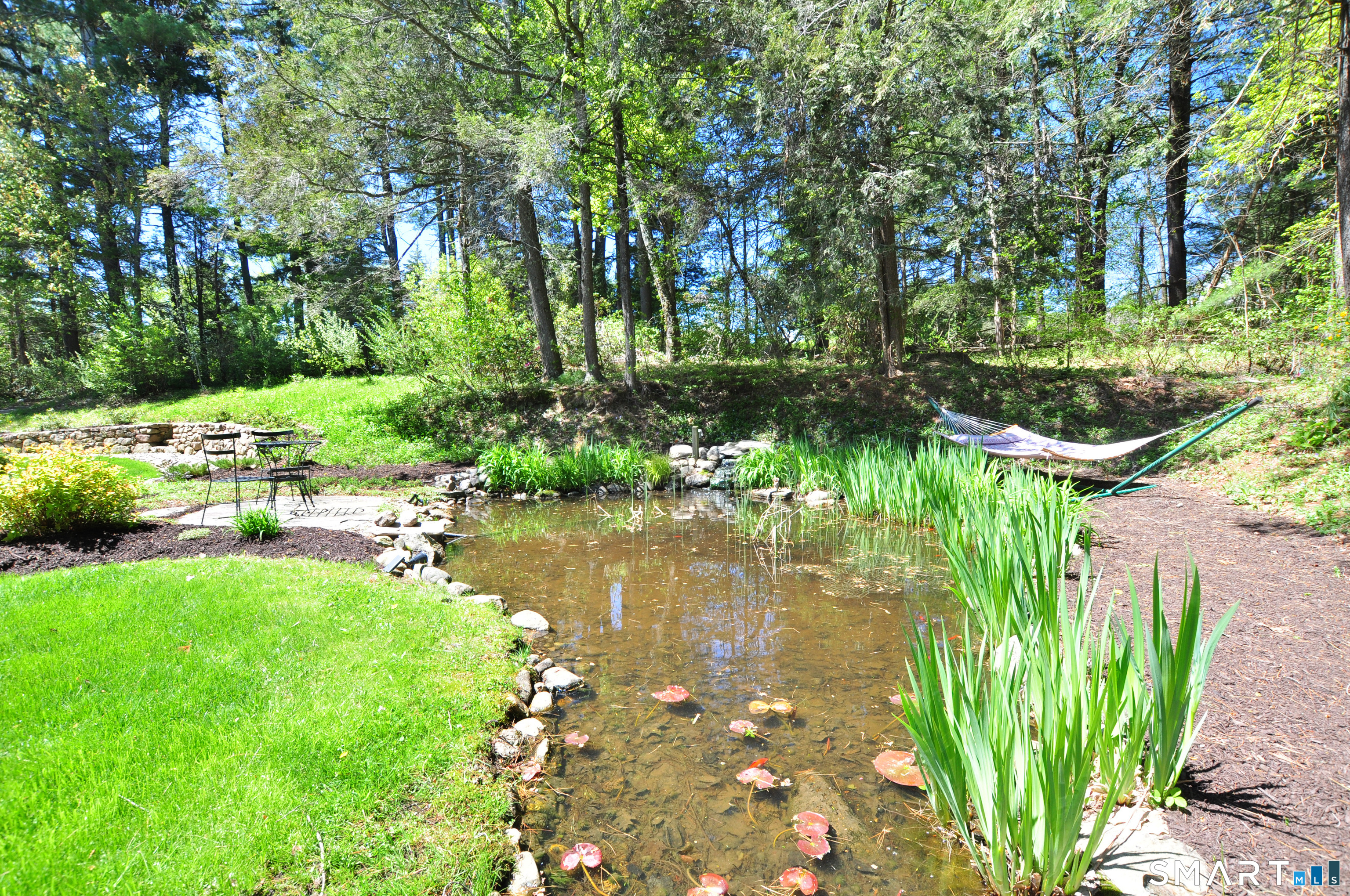 15 Old Orchard Road Granby, CT 06090 - Photo 7 of 33 Relax and enjoy the soothing sounds of the waterfall.