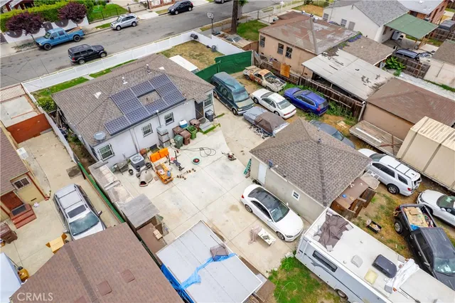 an aerial view of a house with a ocean view