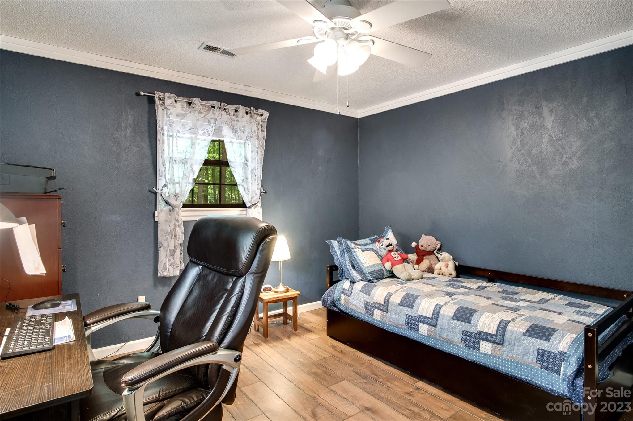 669 Walker Point Road Hayesville, NC 28904 - Photo 11 of 46 a bedroom with furniture and a window