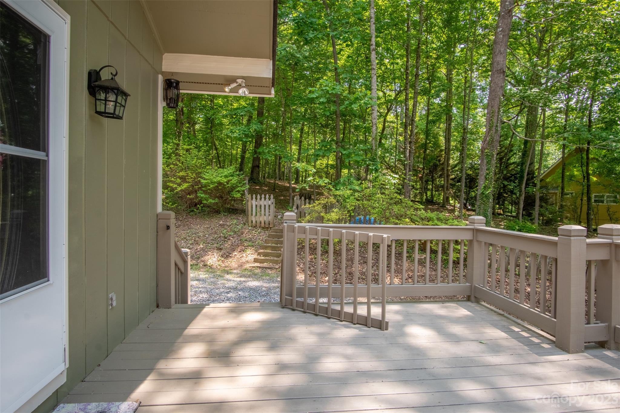 669 Walker Point Road Hayesville, NC 28904 - Photo 33 of 46 a view of a porch with a yard