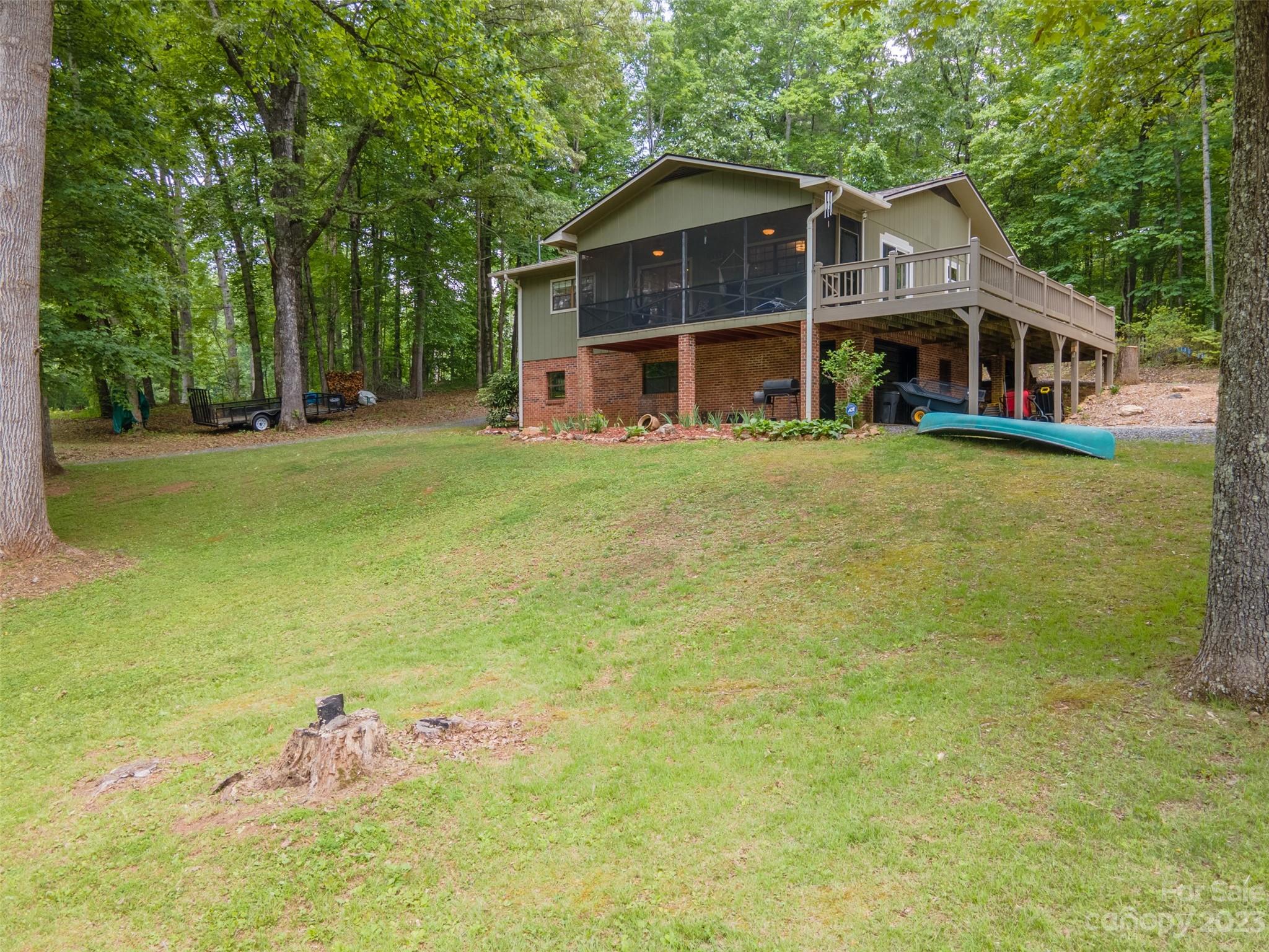 669 Walker Point Road Hayesville, NC 28904 - Photo 38 of 46 a front view of a house with a yard
