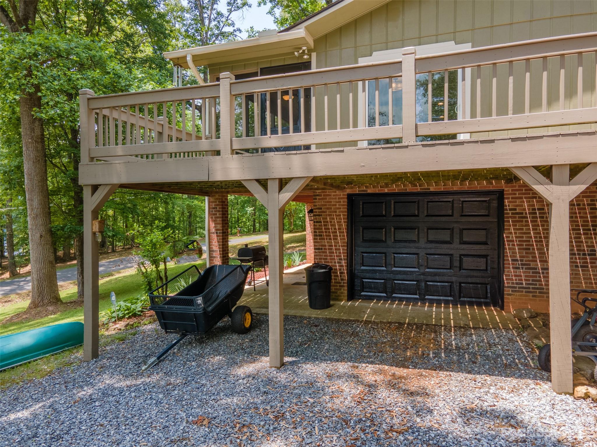 669 Walker Point Road Hayesville, NC 28904 - Photo 42 of 46 a view of a house with a yard