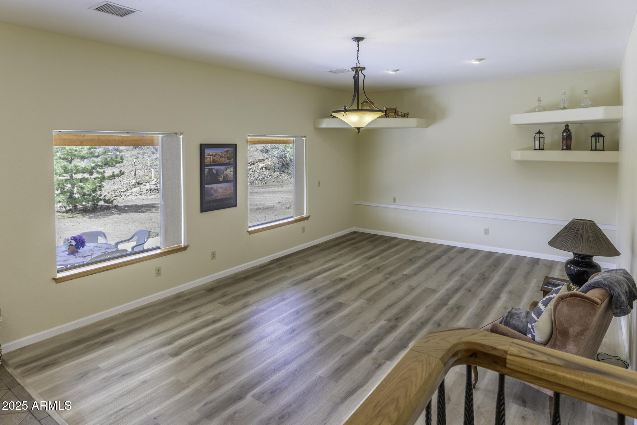 18168 Spoon Road Peeples Valley, AZ 86332 - Photo 20 of 32 a view of an empty room with a window