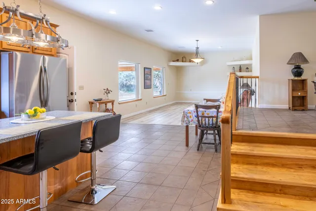 a view of a living room and dining room