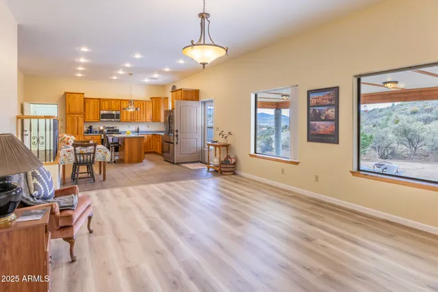 a view of a living room and dining room