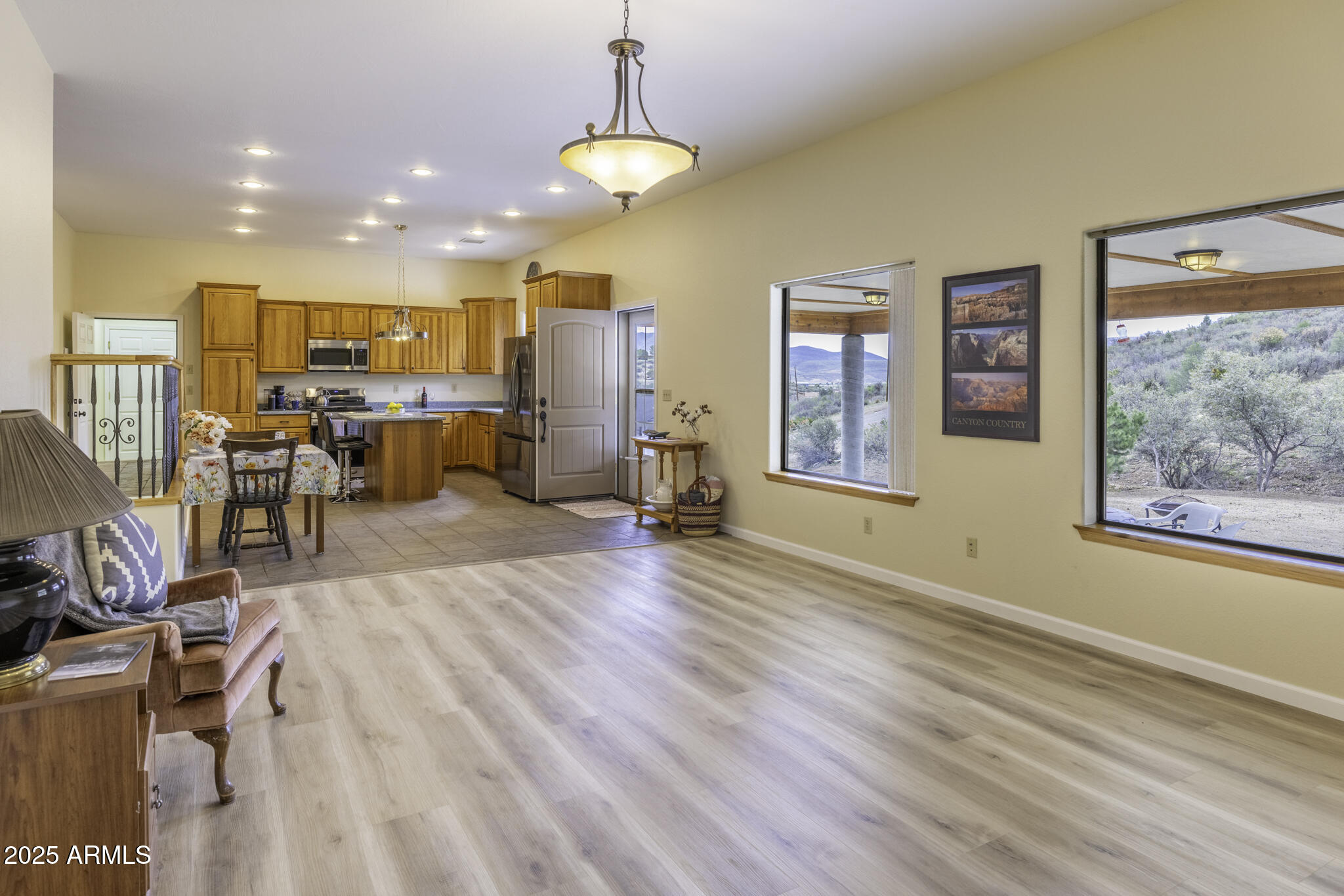 18168 Spoon Road Peeples Valley, AZ 86332 - Photo 22 of 32 a view of a living room and dining room