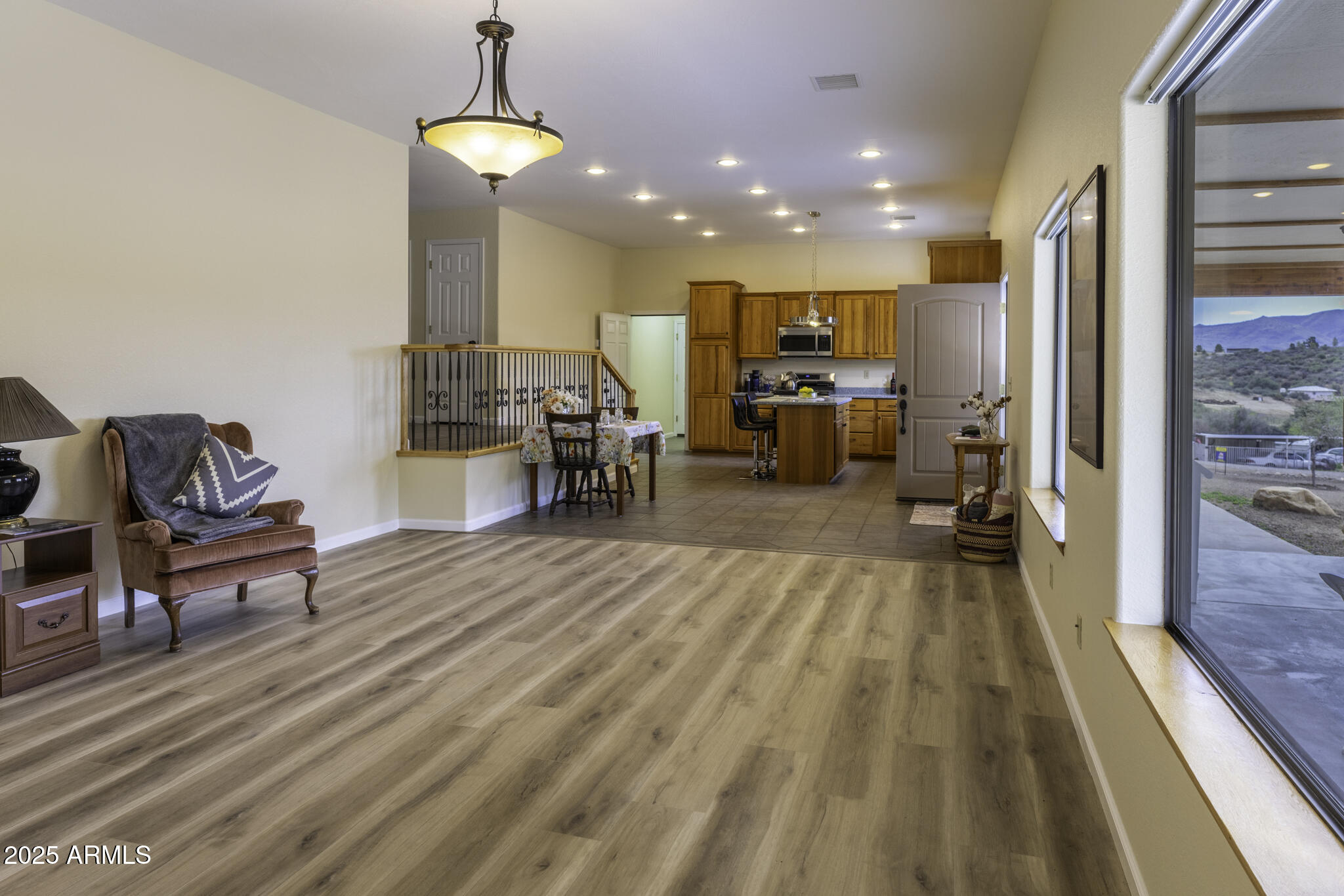 18168 Spoon Road Peeples Valley, AZ 86332 - Photo 23 of 32 a view of a living room and dining room