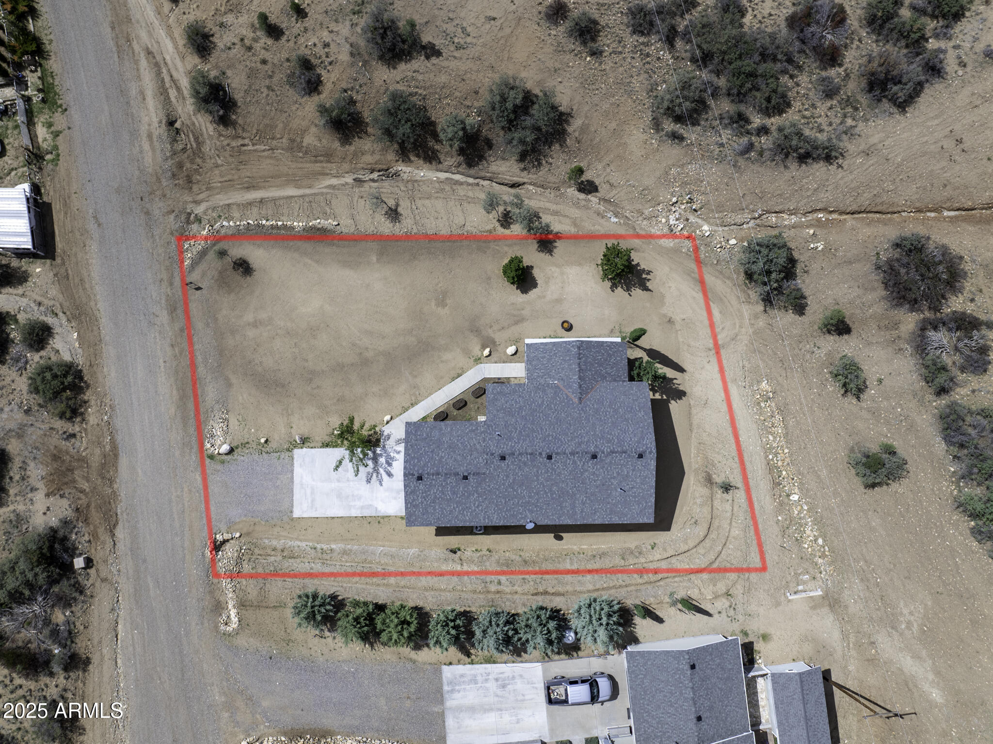 18168 Spoon Road Peeples Valley, AZ 86332 - Photo 31 of 32 an aerial view of a houses with outdoor space