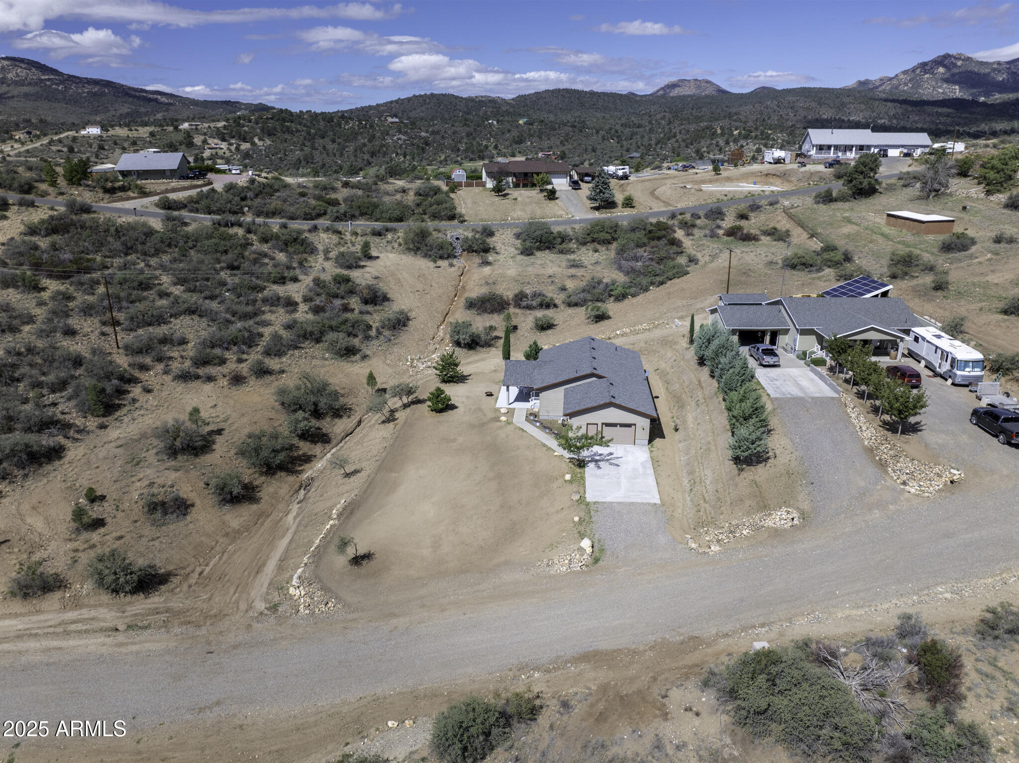 18168 Spoon Road Peeples Valley, AZ 86332 - Photo 32 of 32 an aerial view of residential houses with outdoor space