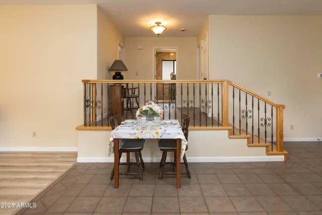 a view of a hallway with seating area