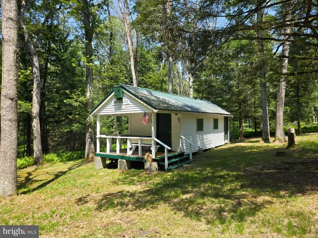 a house with trees in front of it