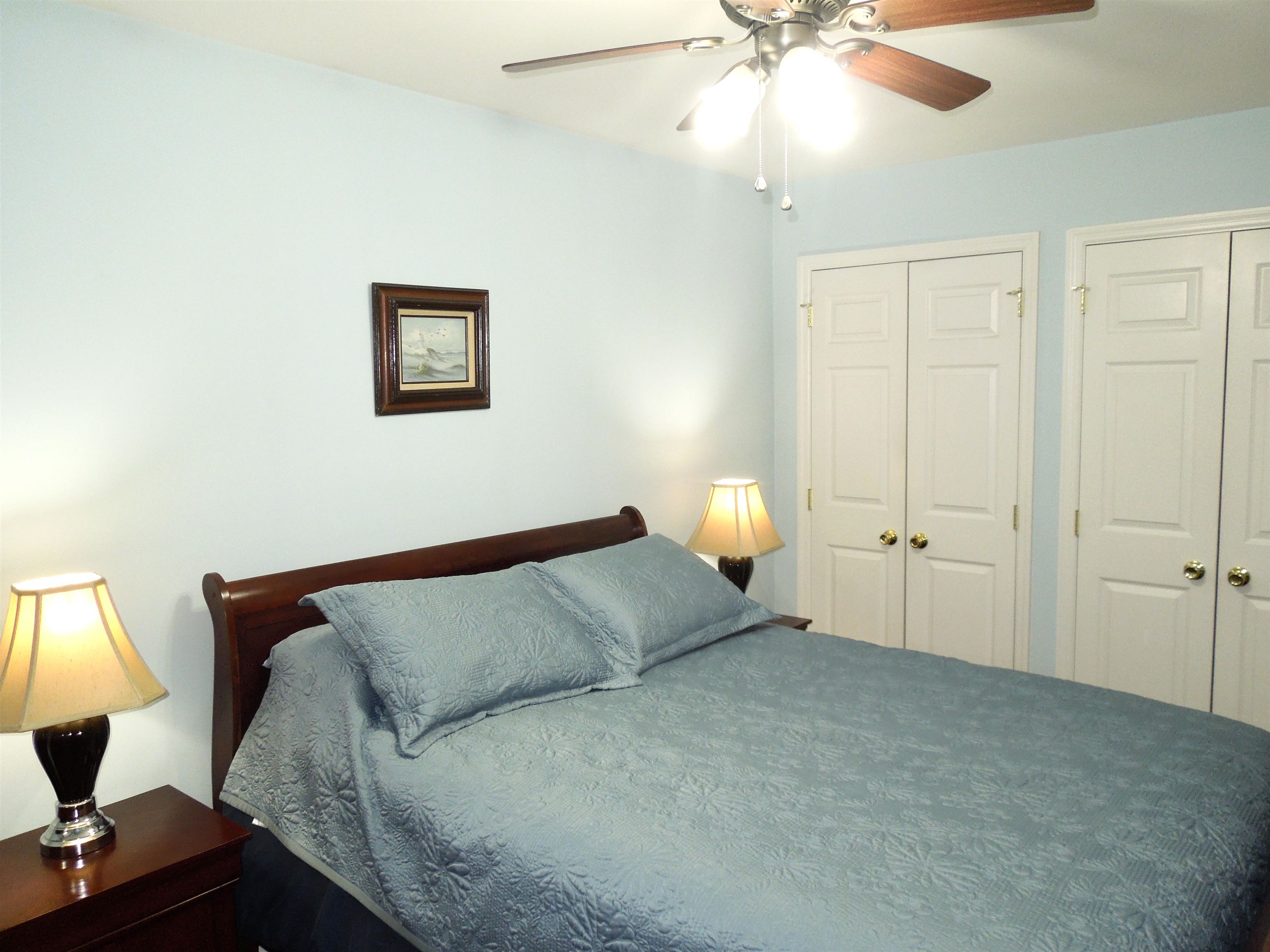 815 Willow Trace Myrtle Beach, SC 29572 - Photo 11 of 20 Bedroom with multiple closets and ceiling fan