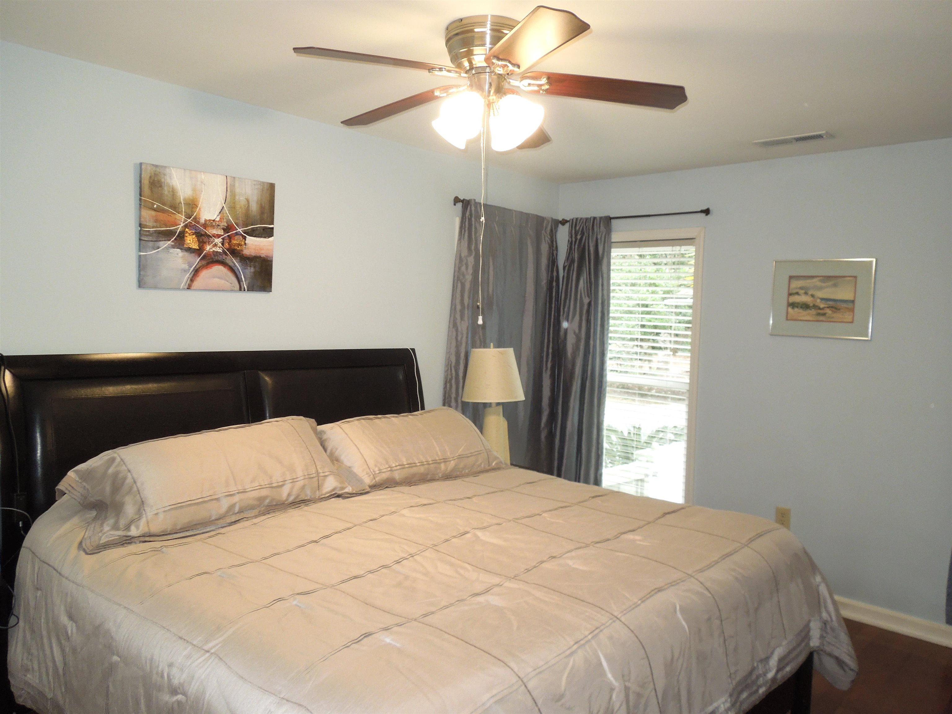 815 Willow Trace Myrtle Beach, SC 29572 - Photo 14 of 20 Bedroom with a ceiling fan and dark wood-style floors