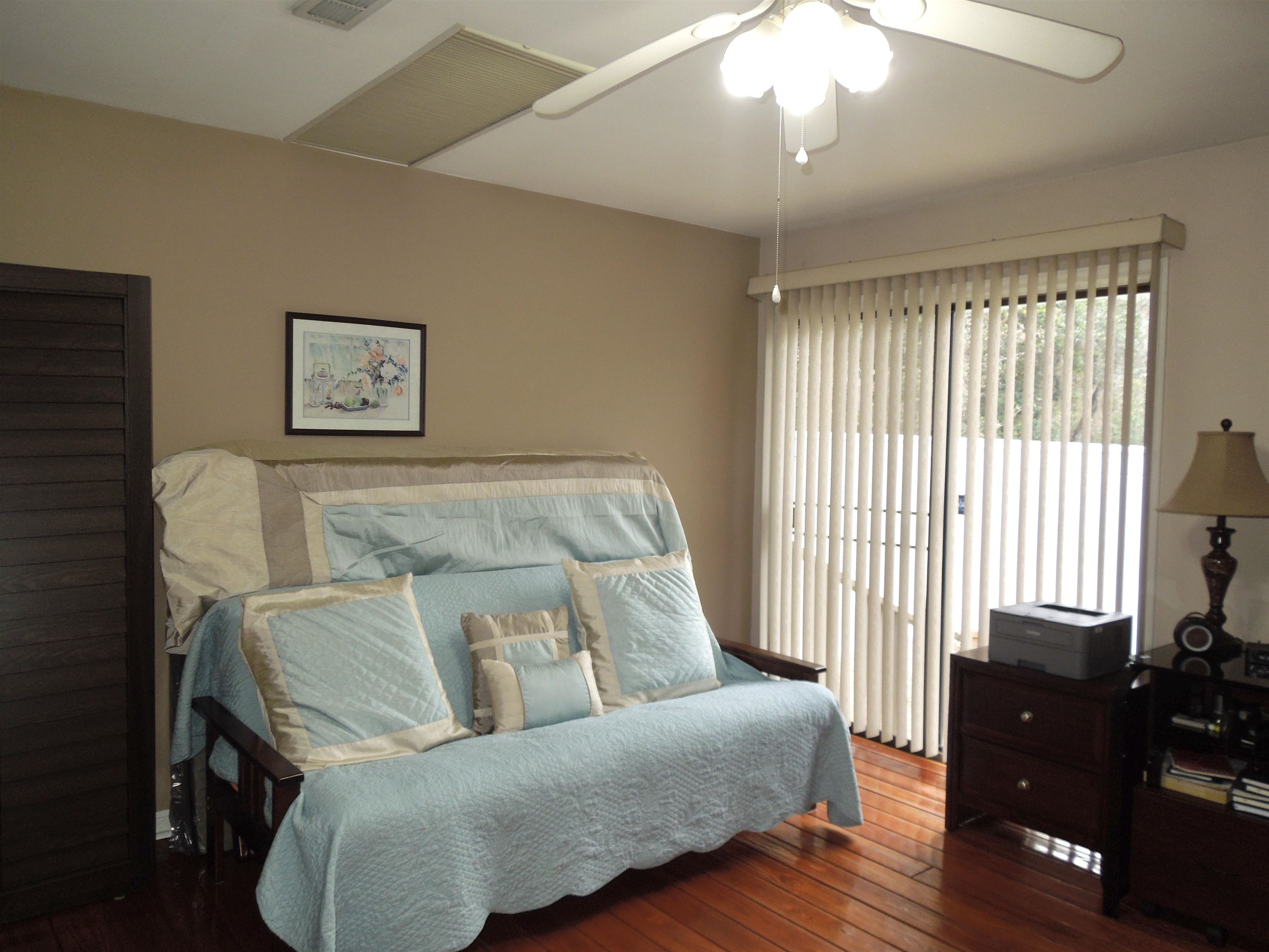 815 Willow Trace Myrtle Beach, SC 29572 - Photo 6 of 20 Bedroom featuring wood-type flooring and ceiling fan