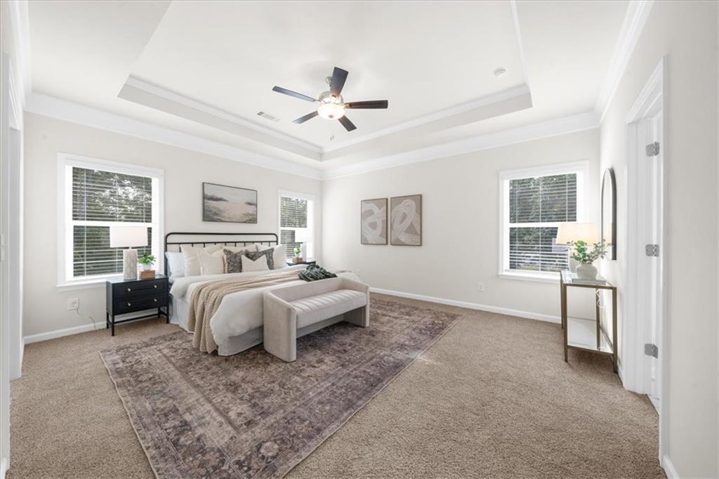 8620 Standing Stone Ball Ground, GA 30107 - Photo 35 of 61 a bed room with a bed and a tv