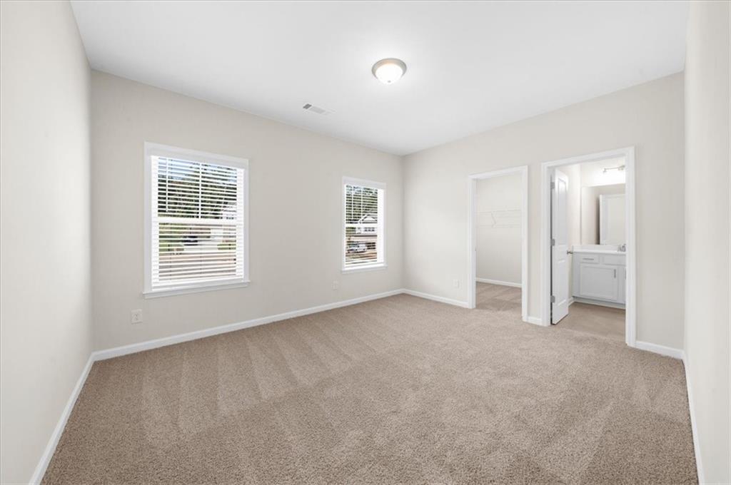 8620 Standing Stone Ball Ground, GA 30107 - Photo 47 of 61 a view of an empty room with a window