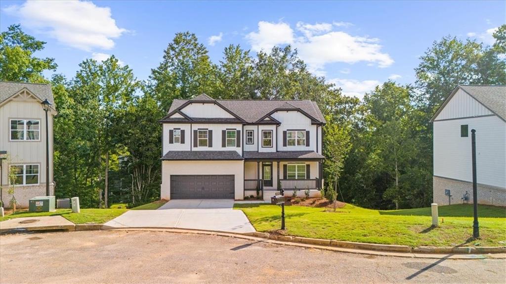 8620 Standing Stone Ball Ground, GA 30107 - Photo 49 of 61 a house with swimming pool in front of it